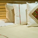 Custom hand embroidered pillows, throw and "guayabillo" wood headboard