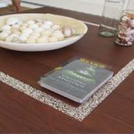 Coffee table with inset " Milagro" silver charms Coffee table with inset " Milagro" silver charms