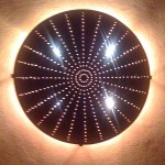 Hand hammered copper light sculpture